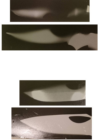 Photograms depecting the silhouette of a knife blade